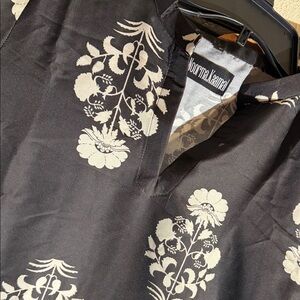 Chic Black Tunic with Cream Floral Design